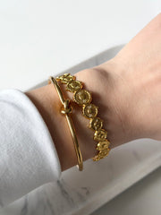 Armreif Statement gold